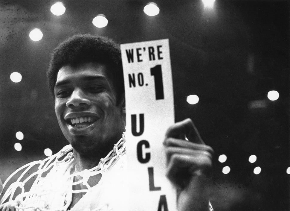 Kareem Abdul-Jabbar (then Lew Alcindor) poses with his championship ribbon after leading the UCLA Bruins to the NCAA champion