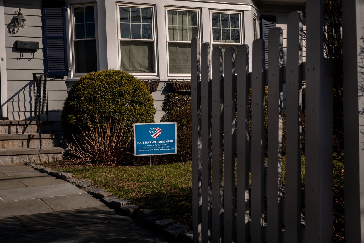 Another house in the Larchmont neighborhood with the sign. 