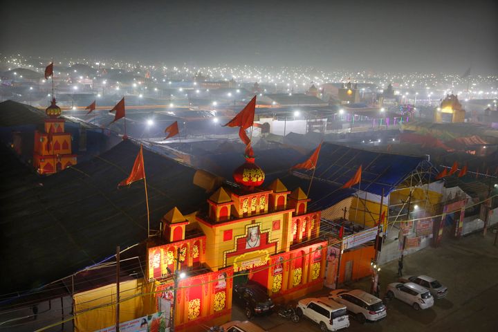 In this Monday, Jan. 14, 2019, photo, a thick layer of dust is seen over the tent city set up for the spiritual-cleansing Kumbh Festival in Prayagraj, India. 