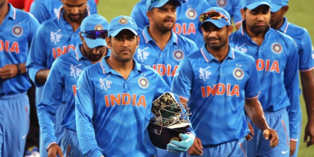 ADELAIDE, AUSTRALIA - FEBRUARY 10: MS Dhoni of India leads the team off the field after the 2015 ICC...