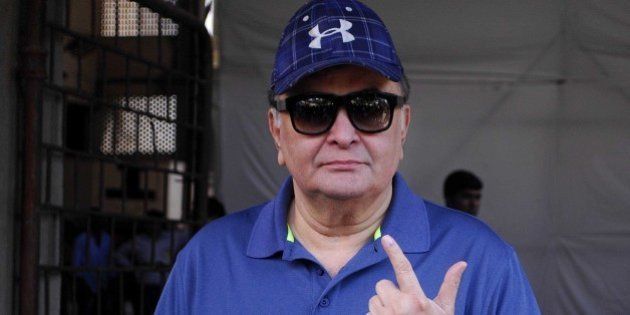 MUMBAI, INDIA OCTOBER 15: Veteran actor Rishi Kapoor showing inked finger after casting vote for Maharashtra Assembly Elections 2014 polls at St. Annes School, Bandra on October 15, 2014 in Mumbai, India. A total of 56 per cent voters exercised their franchise in Maharashtra as polling to elect the new state government ended at 6 PM on Wednesday. The voter turnout was higher as compared to the last assembly elections. The five major parties of Maharashtra have a lot of stake in the State Assembly Elections. With the public of Maharashtra all geared up to vote for the 288-seat Maharashtra Assembly Elections, it will be interesting to see on whose side the people of Maharashtra vote for. (Photo by Prodip Guha/Hindustan Times via Getty Images)