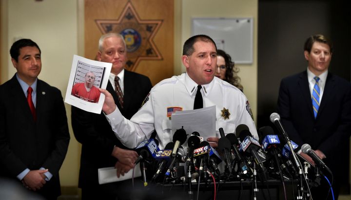 Barron County Sheriff Chris Fitzgerald holds up the booking photo of Jake Thomas Patterson, who allegedly kidnapped Jayme Closs, during a press conference last week