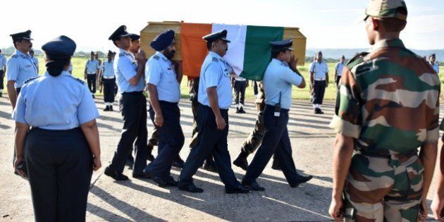 Indian Air Force officials and Indian Army officials carry a casket bearing the body of former President of India APJ Abdul Kalam towards a waiting aircraft at an airforce base in Guwahati on July 28, 2015. India's former president and top scientist A. P. J. Kalam, who played a lead role in the country's nuclear weapons tests, died on July 27, a hospital official said. He was 83. Kalam collapsed during a lecture at a management institute in the northeastern Indian city of Shillong, and was declared dead on arrival by doctors at Bethany hospital. AFP PHOTO/BIJU BORO (Photo credit should read BIJU BORO/AFP/Getty Images)