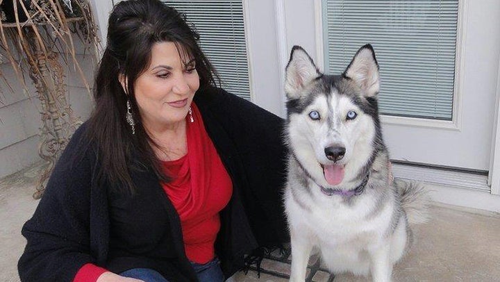 Democratic Rhode Island state Rep. Charlene Lima and her husky, Keiko. Lima has introduced a bill in the state legislature dealing with pet custody, a growing issue in divorce cases. 