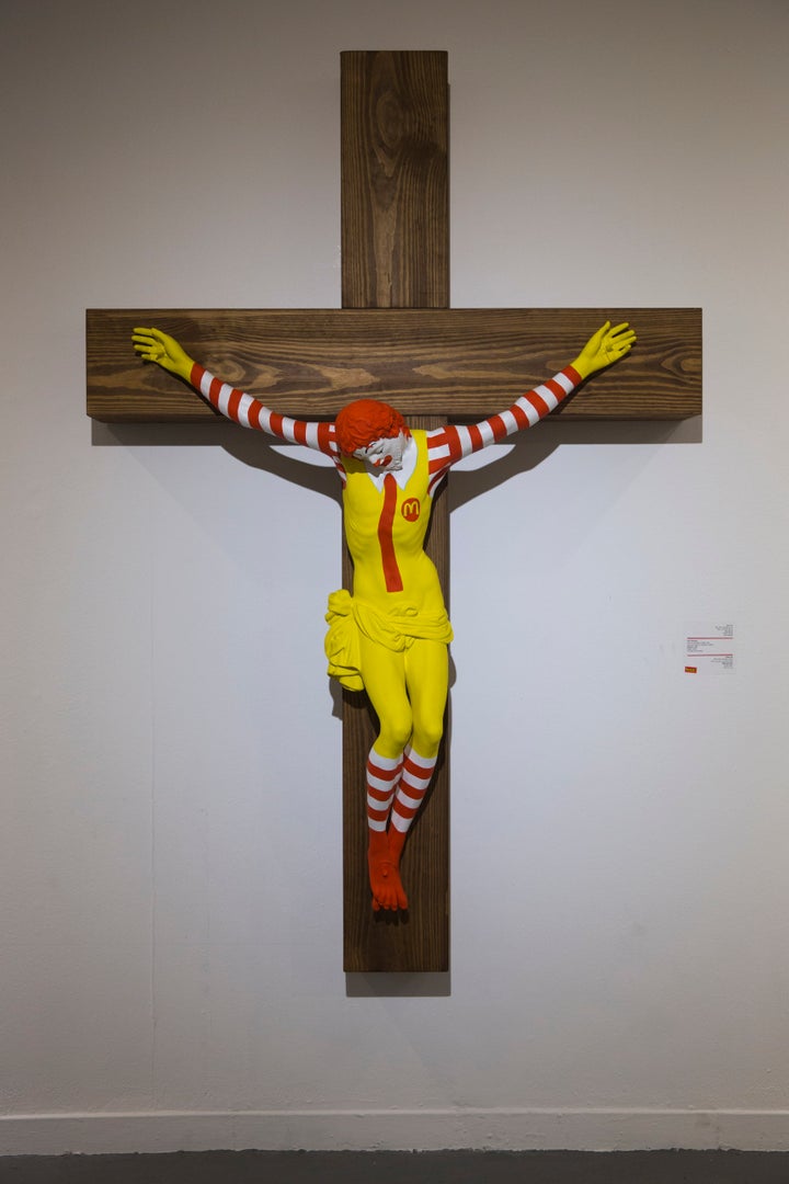 An artwork called "McJesus," which was sculpted by Finnish artist Jani Leinonen and depicts a crucified Ronald McDonald, is seen on display as part of the Haifa museum's "Sacred Goods" exhibit, in Haifa, Israel, Monday, Jan. 14, 2019. 