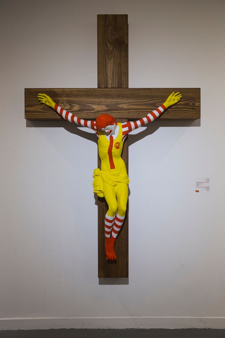 An artwork called "McJesus," which was sculpted by Finnish artist Jani Leinonen and depicts a crucified Ronald McDonald, is seen on display as part of the Haifa museum's "Sacred Goods" exhibit, in Haifa, Israel, Monday, Jan. 14, 2019. 