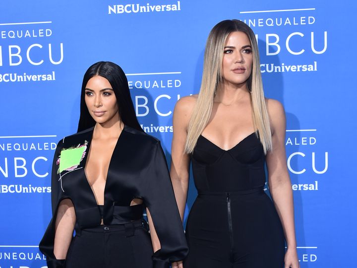 Kim Kardashian and Khloe Kardashian arrive at the 2017 NBC Upfronts presentation.