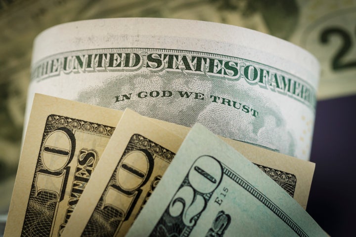 The phrase "In God We Trust," seen on a U.S. dollar bill, became the national motto in 1956.