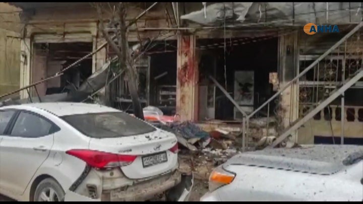 An image grab taken from a video published by Hawar News Agency (ANHA) on January 16, 2019, shows the aftermath of a suicide attack in the northern Syrian town of Manbij. (-/AFP/Getty Images)