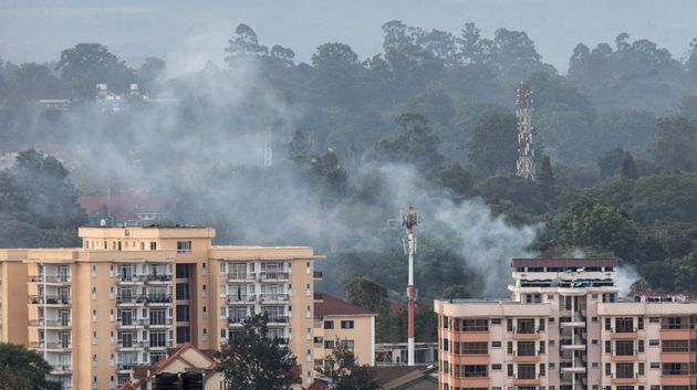 Smoke rises from the blast area after the attack, which saw 14 people lose their lives 