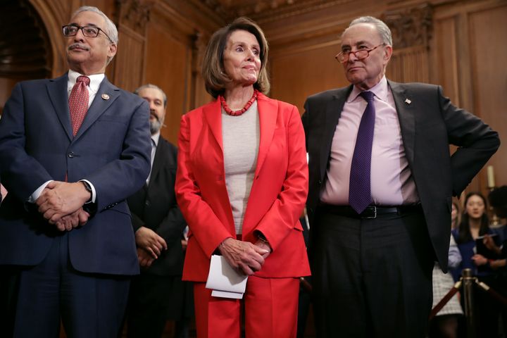House Democrats, led by Speaker Nancy Pelosi (center), hope to pass a minimum wage bill now that they have a majority. However, the legislation's prospects look bleak in the GOP-controlled Senate.