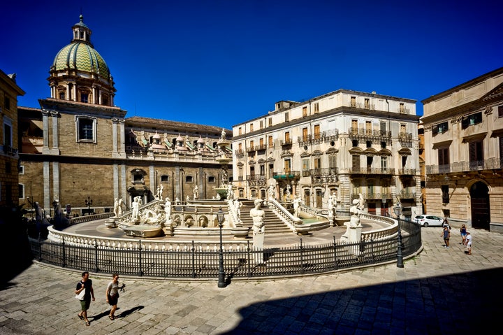 Piazza Pretoria in Palermo features a gorgeous fountain and several statues.