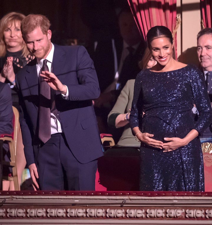 Waving to the crowd at Royal Albert Hall. 