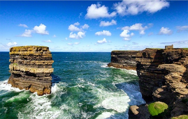 Downpatrick Head and Dún Briste Sea Stack on a sunny day.