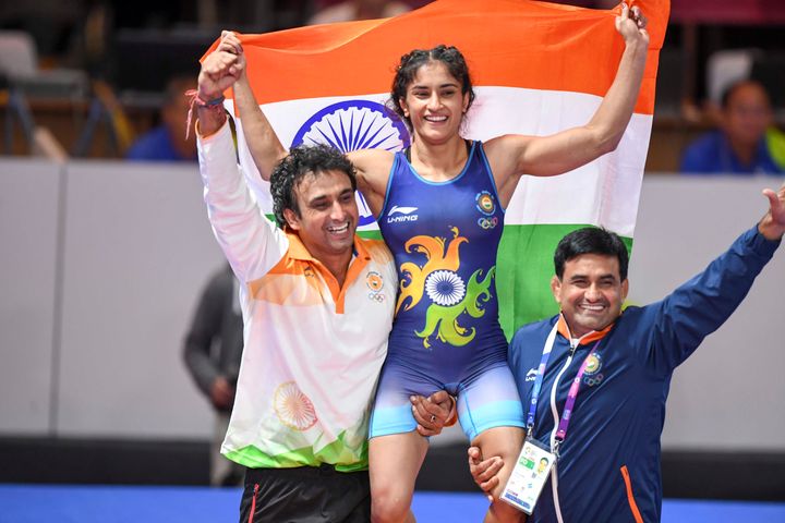  Vinesh Phogat celebrates after defeating Irie Yuki of Japan in the Women's Wrestling Freestyle 50kg Final on day two of the 2018 Asian Games in Jakarta, Indonesia on 20 August 2018.