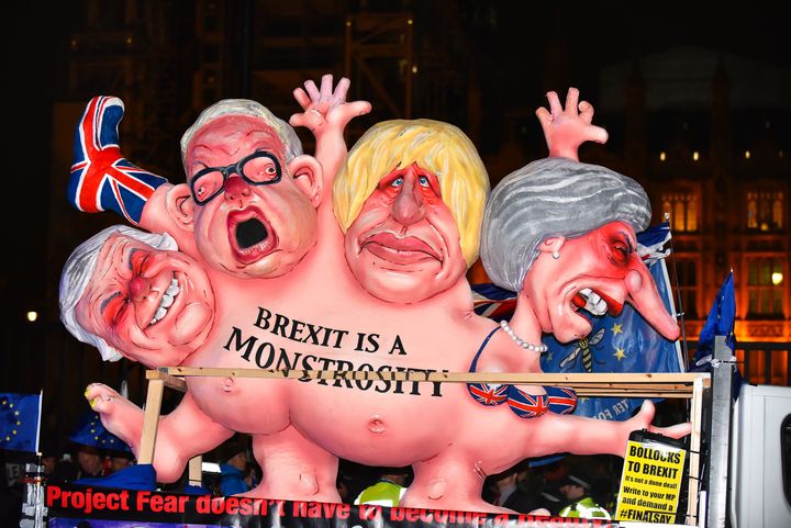 Caricatures of senior tories calling Brexit a 'monstrosity' were driven through Westminster as MPs voted on May's Brexit deal 