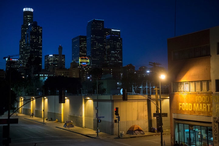 Homeless people sleep in the Skid Row area of downtown Los Angeles.