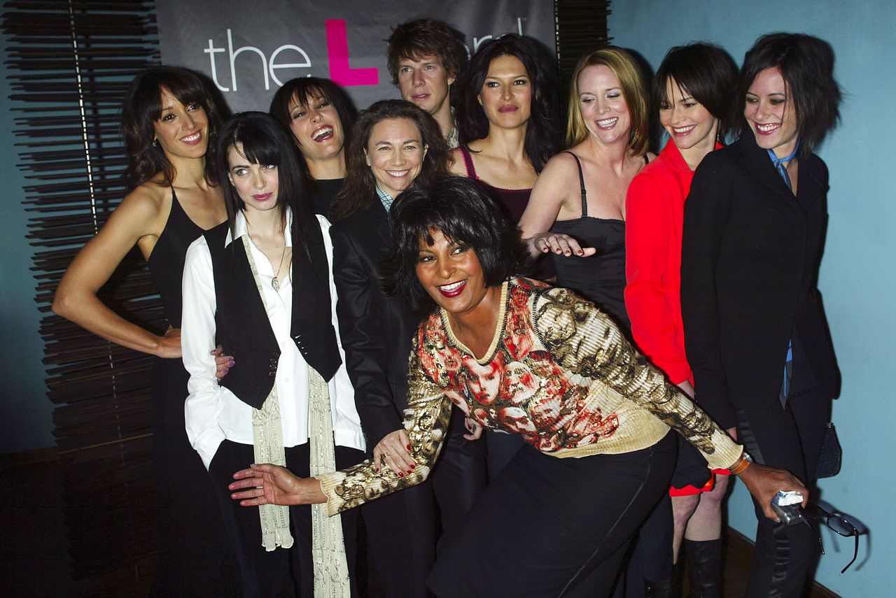 Cast members Jennifer Beals, Pam Grier, Erin Daniels, Leisha Hailey, Laurel Holloman, Mia Kirshner, Karina Lombard, Eric Mabius, Katherine Moennig and Executive Producer Ilene Chaiken at a preview luncheon for Showtime's new original series 'The L Word' at Blue Fin October 23, 2003 in New York City. (Photo by Scott Gries/Getty Images)