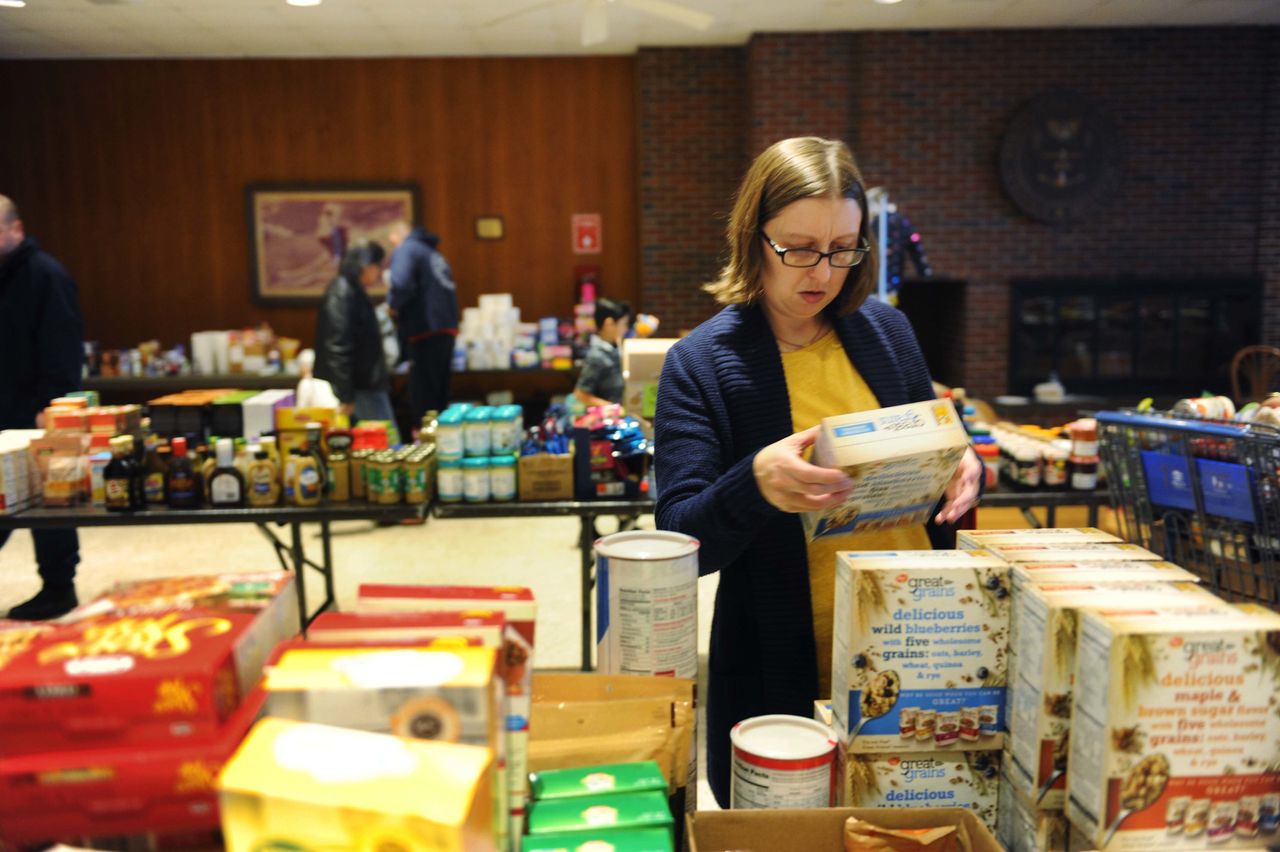 Katie Walvatne, president of the Southeastern Connecticut U.S. Coast Guard Spouses’ Association and wife of a Coast Guard mechanic, said her family is relying on the food pantry during the shutdown.