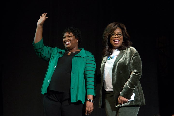 Oprah Winfrey takes part in a town hall meeting with Democratic gubernatorial candidate Stacey Abrams in Marietta, Ga., on Nov. 1, 2018.