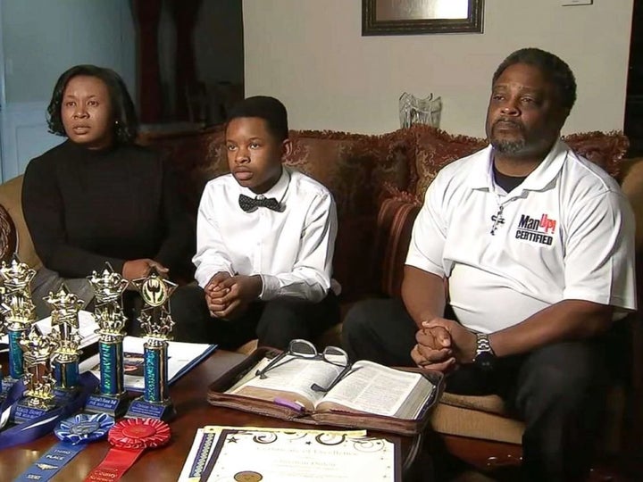 Christian Philon, 12, and his parents, Gwen and Earvin Philon.