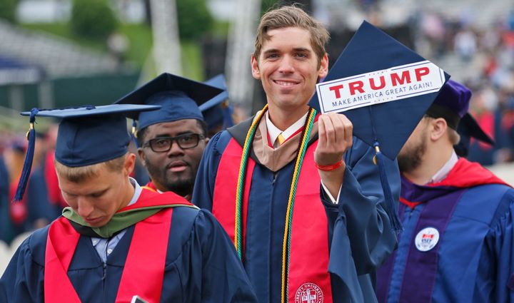 Liberty University student David Westcott Jr. displays a "Make America great again" sticker on his mortarboard during the May 2017 commencement.