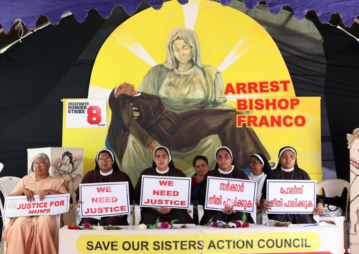 Nuns hold placards during a protest demanding justice after an alleged sexual assault of a nun by a bishop, on September 2018 in Kochi, Kerala