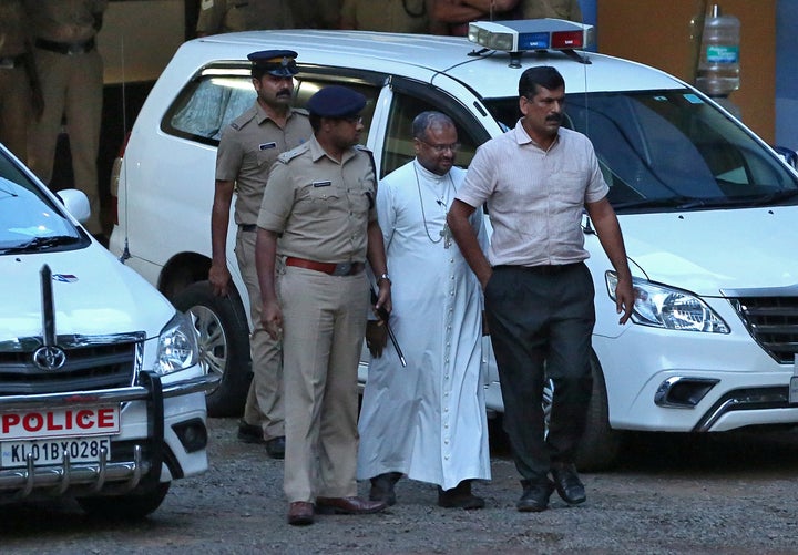 Bishop Franco Mulakkal (2nd R), accused of raping a nun, is pictured outside a crime branch office on the outskirts of Kochi in September 2018