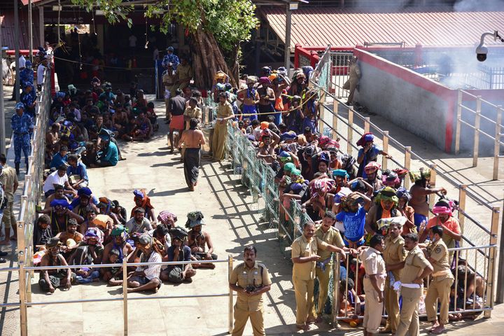 Devotees wait in line to visit the Sabarimala temple in Kerala.