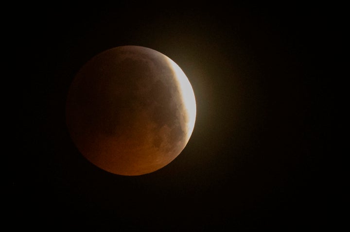 A super blood wolf moon over Liverpool during a lunar eclipse.