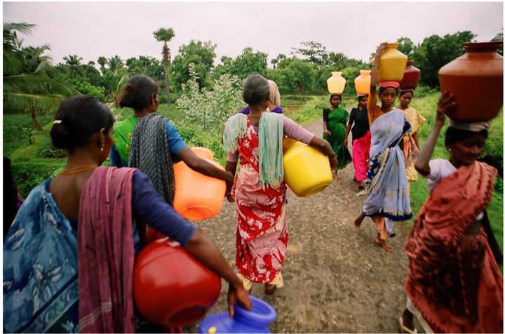 Women in Plachimada walk kilometres every day to get drinking water.