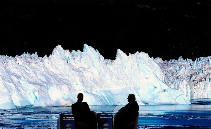 Britain's Prince William and natural historian Sir David Attenborough, watch the screening of Attenborough's new documentary