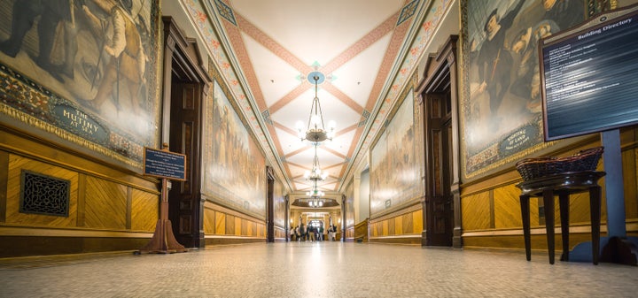 An October 2015 photo shows Christopher Columbus murals in Notre Dame's Main Building.