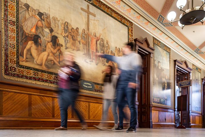 An October 2015 photo shows a Columbus mural in Notre Dame's Main Building.
