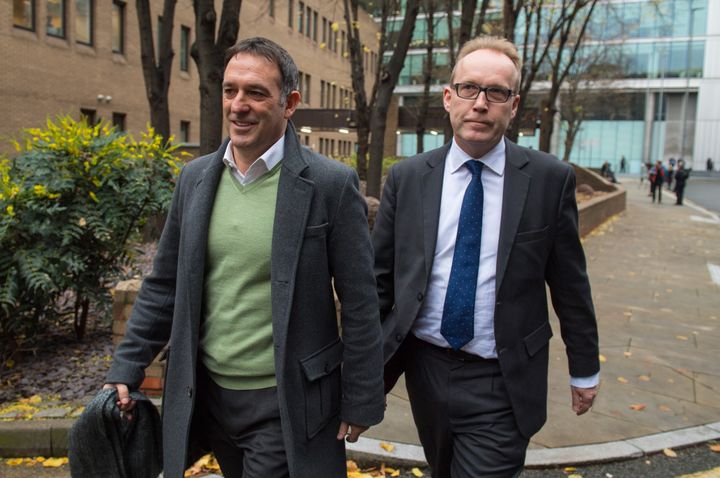 Former Tesco UK managing director Chris Bush (left) leaves Southwark Crown Court, in London, after being acquitted of charges of fraud and false accounting.
