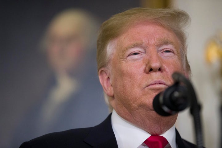 President Donald Trump has been criticized over his administration granting classified security clearances to a number of off
