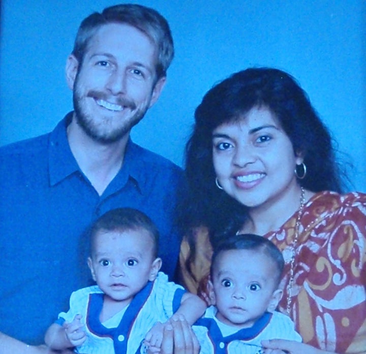 The author, her husband and their twin sons.