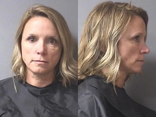 Casey Smitherman was arrested after allegedly using her health insurance to cover the price of medicine for a sick child at a school where she worked.