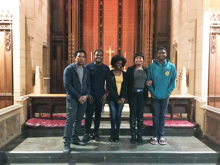 The Thompson family, (from left) Clive, CJ, Christine, Oneita and Timothy, stand in the sanctuary of the First United Methodist Church of Germantown, where the parents and their two youngest children have been living since August. 