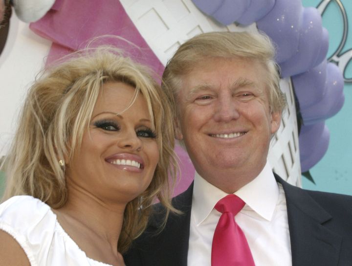 Trump poses with Pamela Anderson at his birthday event at the Trump Taj Mahal in Atlantic City in 2005. 