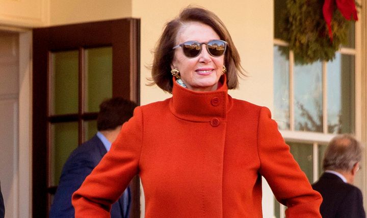 House Speaker Nancy Pelosi (D-Calif.), confidently leaving the White House after a meeting in December, quickly became a meme with her red coat.