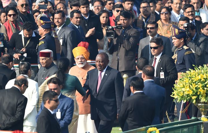 Prime Minister Narendra Modi, President Ram Nath Kovind and South African President Cyril Ramaphosa meet officials ahead of the 70th Republic Day parade in New Delhi on January 26, 2019.