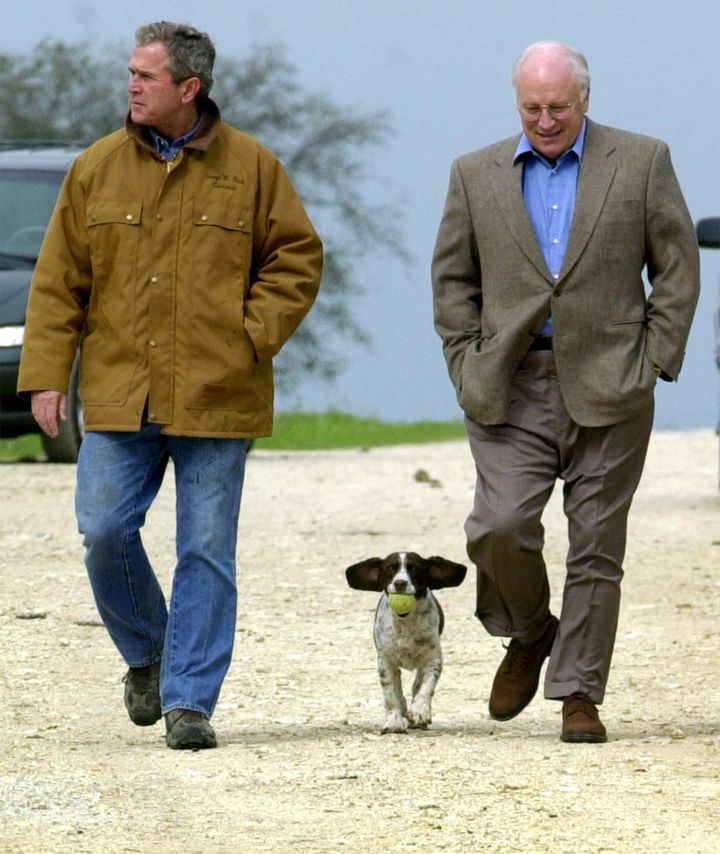 George Bush and Dick Cheney (with Bush's dog) in 2000