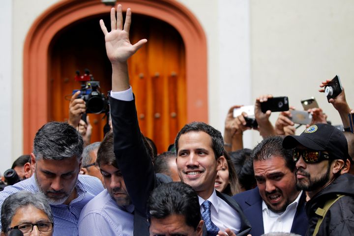 Venezuela's opposition leader Juan Guaido gestures as he arrives for a news conference in Caracas, Venezuela on Friday.