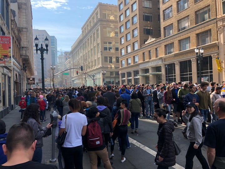 The line to get in the rally stretched for several city blocks. 