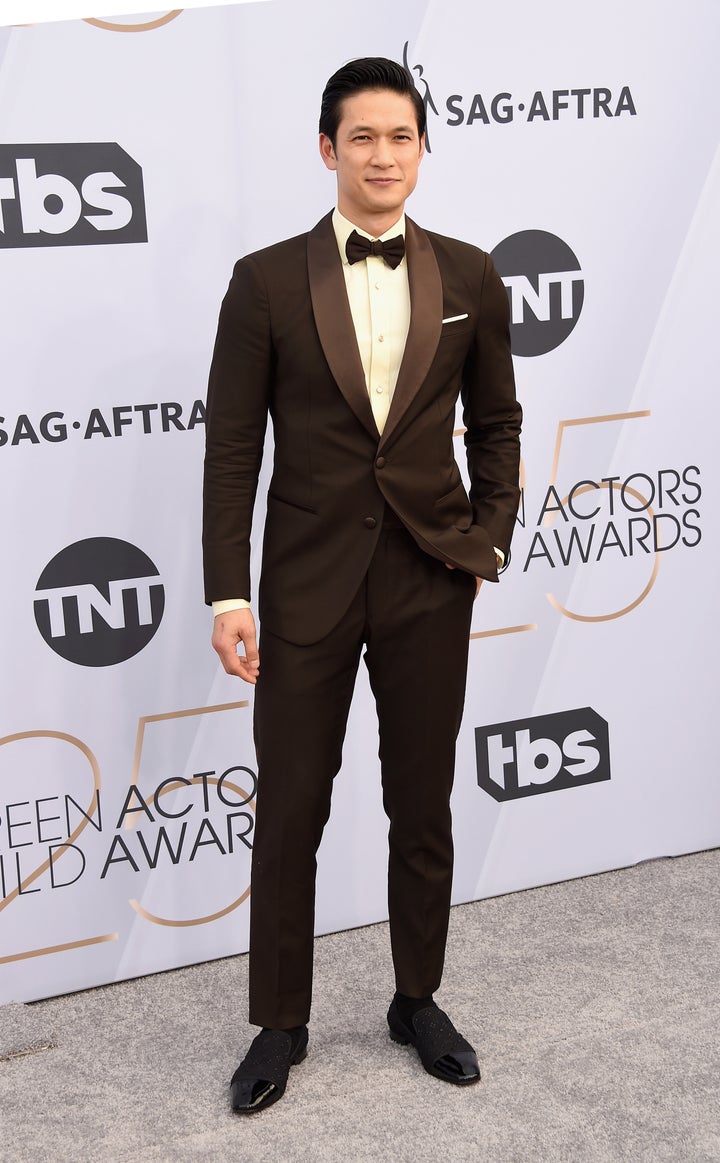 Harry Shum Jr. in a traditional black tux.