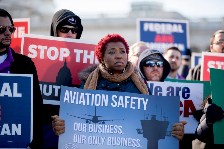 Union members and other federal employees protest the government shutdown on Capitol Hill in Washington, Thursday, Jan. 10, 2019.