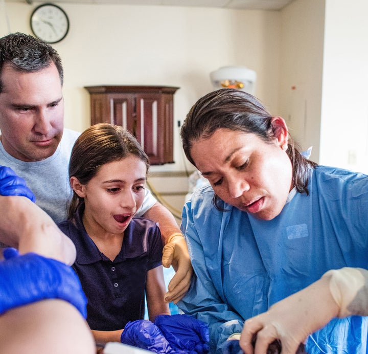 Ten-year-old Kayla caught her newborn sister, Everly. 