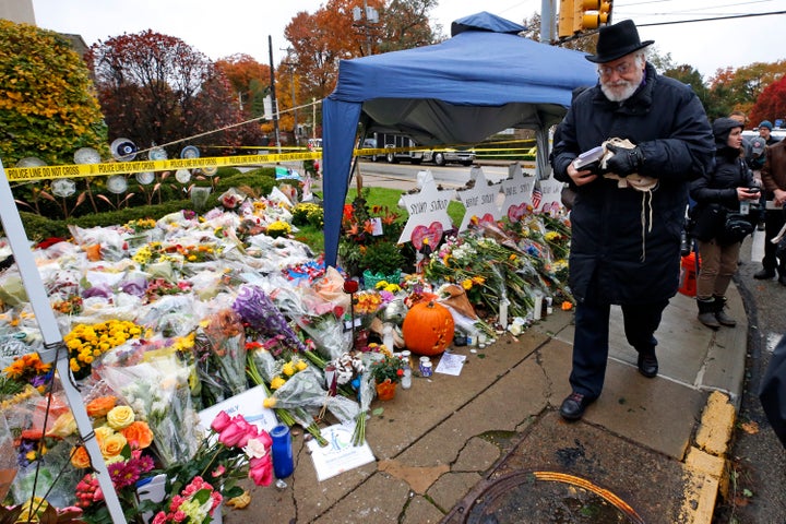 Rabbi Chuck Diamond arrives on the street corner outside the Tree of Life Synagogue on Nov. 3, 2018, to lead a Shabbat morning service one week after 11 people were killed and six wounded in a shooting at the synagogue.