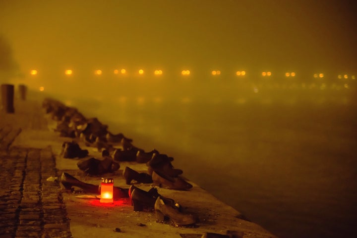 Shoes on the Danube Bank candles at the memorial, Budapest Hungary